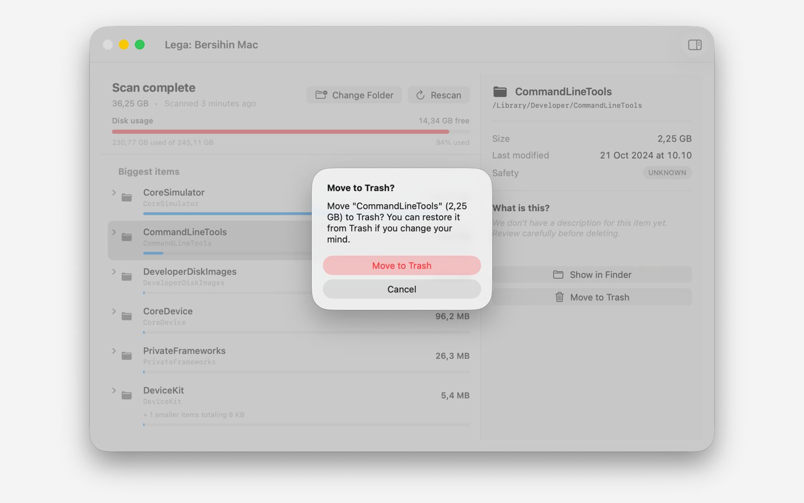 Dialog konfirmasi Lega sebelum memindahkan item ke Sampah macOS